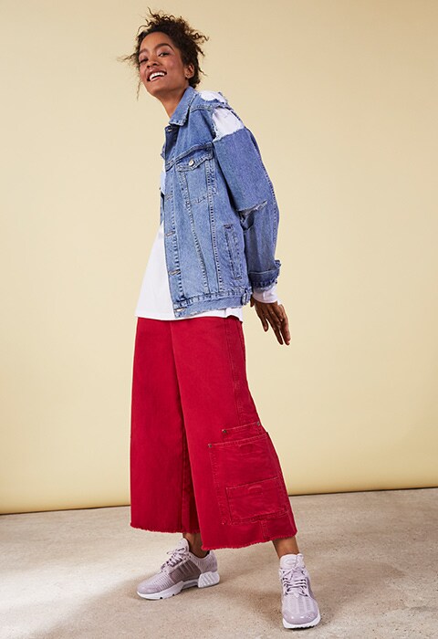 Model wearing white T-Shirt with shirting detail, denim jacket, red skater jeans and adidas Originals Ice Purple Climacool trainers, all available at ASOS | ASOS Fashion & Beauty Feed