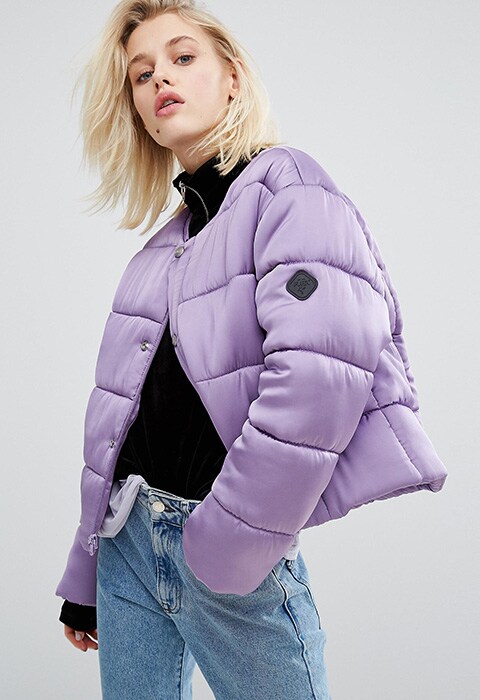 Model wearing lilac Puffa oversized, collarless padded jacket, available at ASOS | ASOS Fashion & Beauty Feed