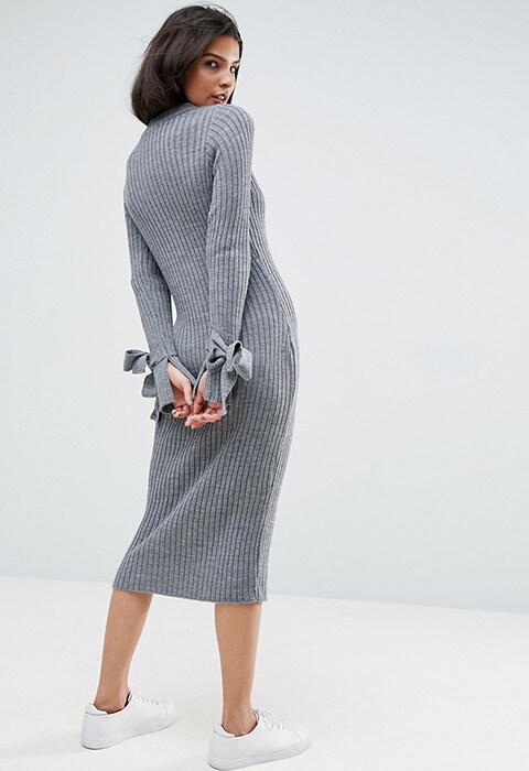 model wearing ASOS knitted rib dress, available at ASOS