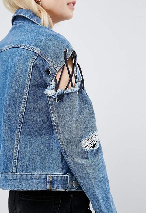 model wearing ASOS Denim Deconstructed Jacket with Lace up Detail, available on ASOS
