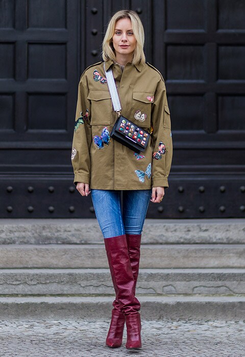 Lisa Hahnbück wearing a Fendi cross-body bag with jeans and a military jacket | ASOS Fashion & Beauty Feed