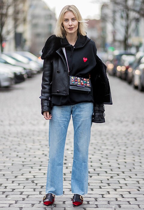 Lisa Hahnbück wearing a Fendi cross-body bag with jeans and a hoodie | ASOS Fashion & Beauty Feed