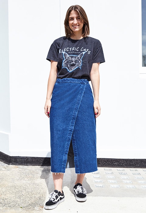 Lottie Selby junior project manager wearing band tee, denim wraparound skirt and Vans trainers | ASOS Fashion and Beauty Feed