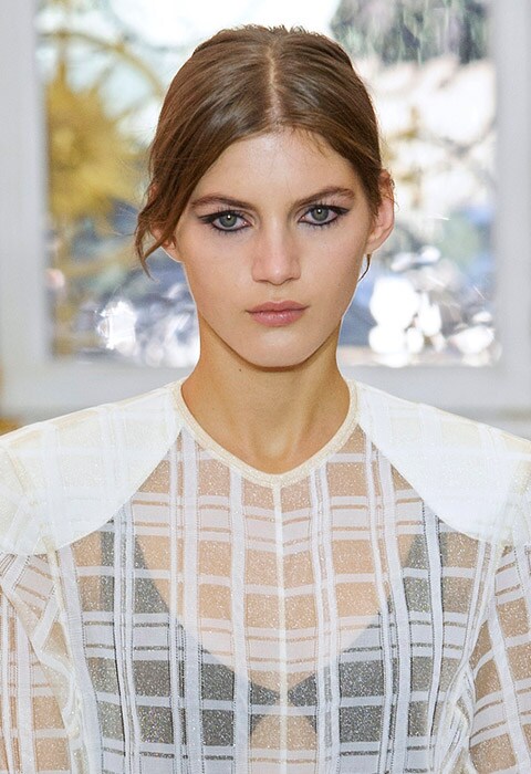 Louis Vuitton SS17 model with full circle eyeliner make-up | ASOS Fashion & Beauty Feed