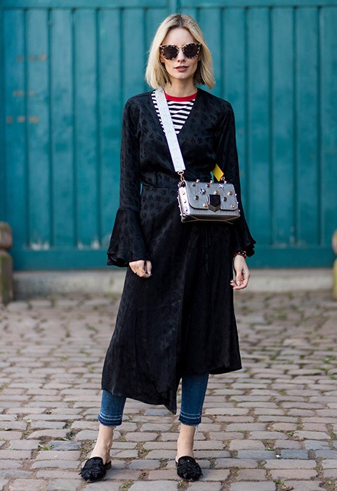 Blogger Lisa Hahnbueck wearing duster coat, jeans and backless slippers  | ASOS Fashion and Beauty Feed