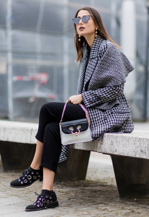 German fashion blogger Julia Haghjoo wearing hardware accessories.
