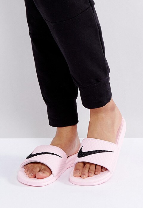Nike Benassi Logo Sliders In Pink, available at ASOS | ASOS Fashion and Beauty Feed