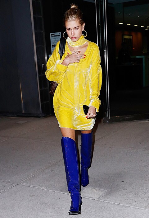 Hailey Baldwin wearing velvet yellow dress and blue boots | ASOS Fashion and Beauty Feed