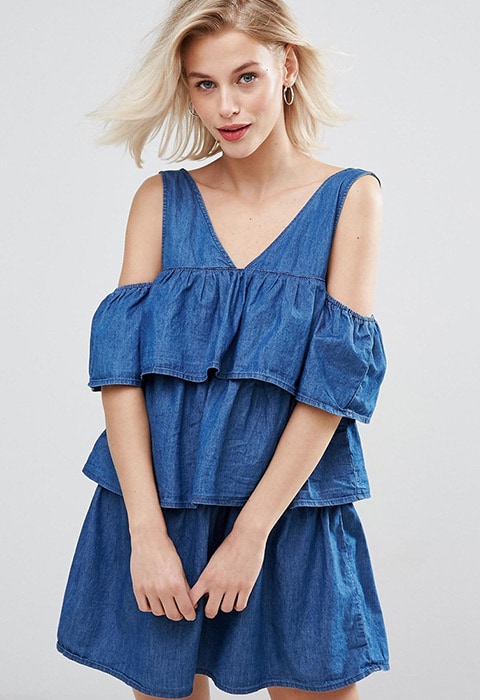 Model wearing Pull & Bear blue denim ruffle dress with tiers, available at ASOS | ASOS Fashion & Beauty Feed