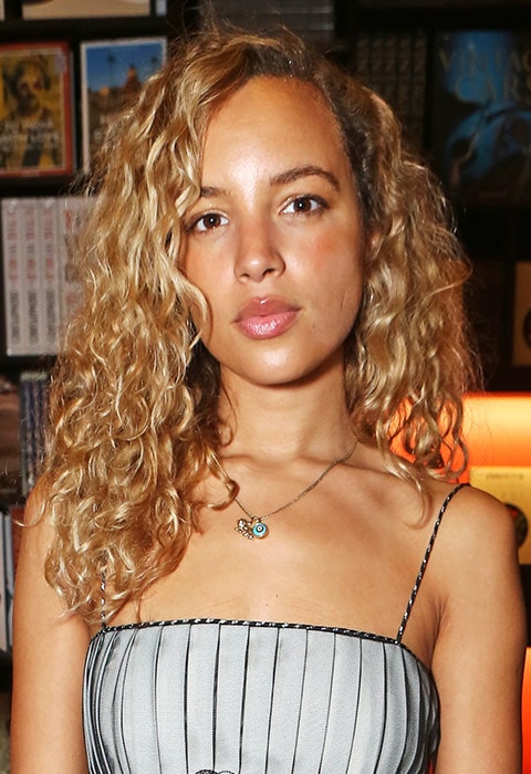 Phoebe Collings-James with side parted curly hair style | ASOS Fashion & Beauty Feed