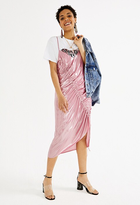 ASOS pink midi dress with rouching detail styled with a logo t-shirt, denim jacket and block heeled shoes | ASOS Fashion & Beauty Feed