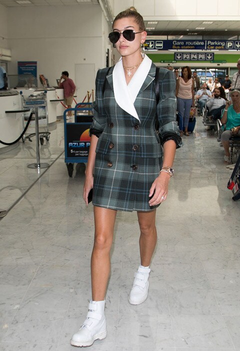 Hailey Baldwin wearing oversized check blazer and white hi-top trainers | ASOS Fashion & Beauty Feed