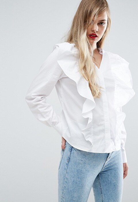 Model wearing ASOS Shirt with V neck and exaggerated ruffle front, available on ASOS | ASOS Fashion & Beauty Feed