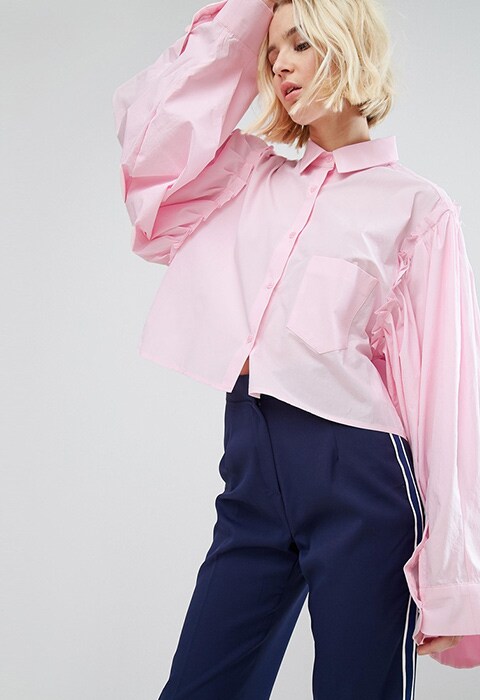 Model wearing STYLENANDA cropped shirt with puff sleeves and raw hem, available on ASOS | ASOS Fashion & Beauty Feed