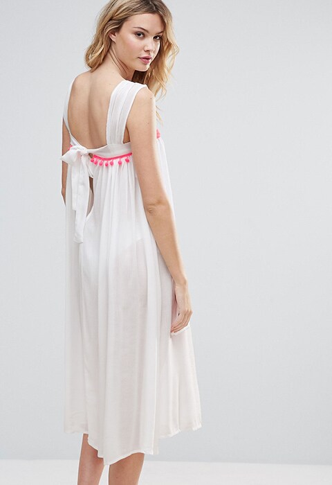 Model wearing ASOS Tall pom pom dress, available at ASOS | ASOS Fashion & Beauty Feed