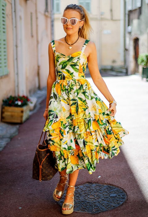 Singer Tallia Storm wearing a lemon print dress | ASOS Fashion & Beauty Feed