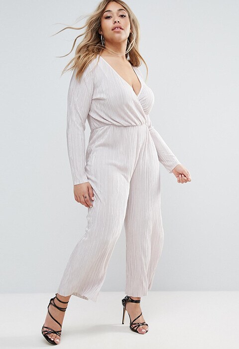 Model wearing white ASOS Curve plisse jumpsuit with wrap front | ASOS Fashion & Beauty Feed