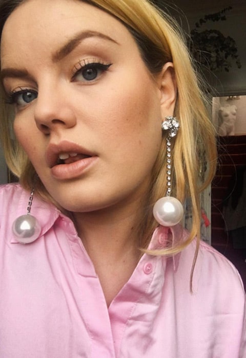 ASOS Insider Lotte wearing pearl drop earrings. Available at ASOS