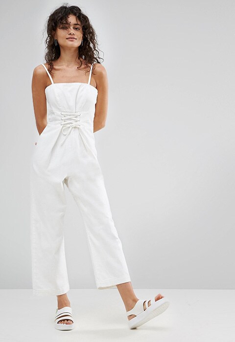 Model wearing white ASOS denim jumpsuit with corset detail | ASOS Fashion & Beauty Feed