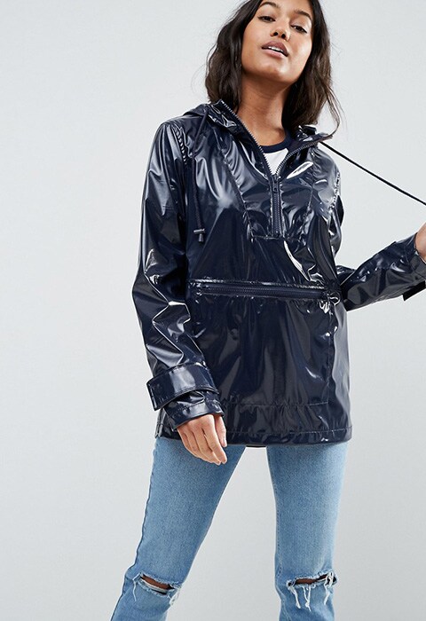 model wearing ASOS Over the Head Rain Mac in Vinyl, available on ASOS