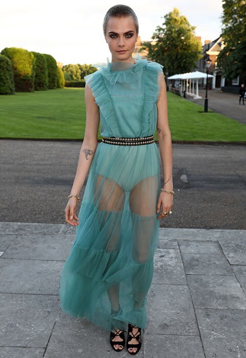 Cara Delevingne wearing a tulle, sheer mint-green dress | ASOS Fashion & Beauty Feed