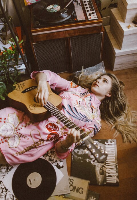 YouTube blogger Marie Novosad wearing a pink, patterned one-piece | ASOS Fashion & Beauty Feed