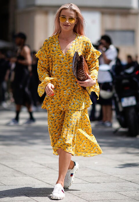 Polish blogger Julia Kuczyńska wearing a yellow floral dress | ASOS Fashion & Beauty Feed