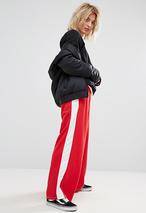 model wearing Adolescent Clothing Wide Leg Joggers With Side Stripe, available on ASOS