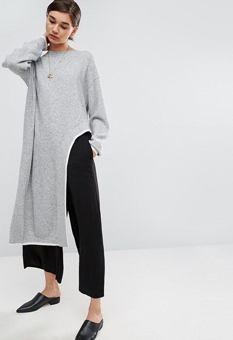 Model wearing grey ASOS WHITE curved-seam knitted jumper, available at ASOS | ASOS Fashion & Beauty Feed 