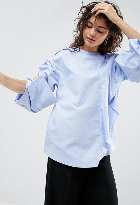 Model wearing pale blue ASOS WHITE recon shirt with popper-sleeve details, available at ASOS | ASOS Fashion & Beauty Feed 