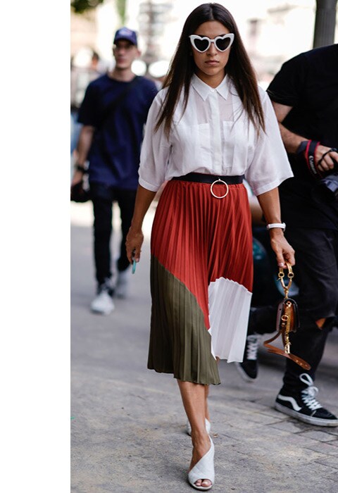 Blogger wearing a pleated skirt and shirt at Paris Couture Fashion Week | ASOS Fashion & Beauty Feed