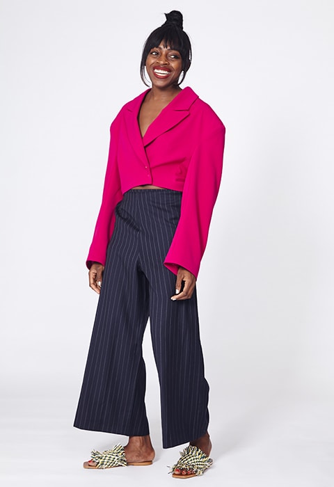 ASOS Insider Debbie wearing a fuschia cropped blazer, pinstripe trousers and sliders | ASOS Fashion & Beauty Feed