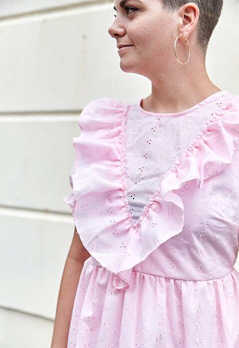 ASOS staff Rosie Sutcliffe-Smith wearing a broderie anglaise dress | ASOS Fashion & Beauty Feed