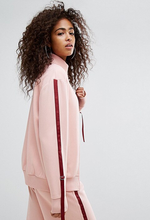 model wearing Ellesse Tracksuit Top With Side Pull Ties, available on ASOS | ASOS Fashion & Beauty Feed