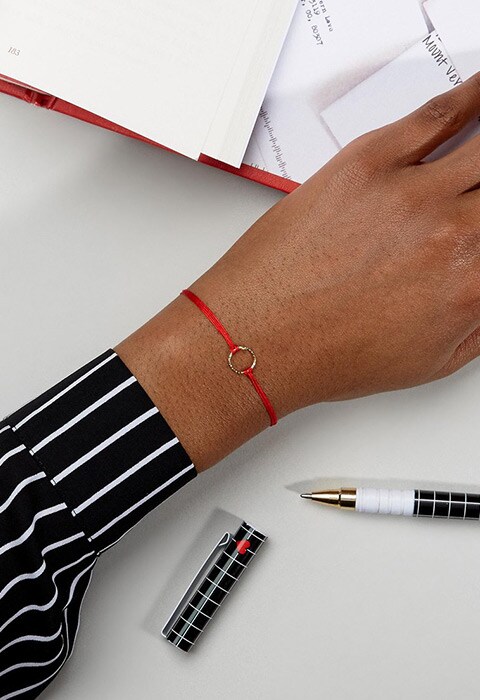 Dogeared gold-plated Karma red sparkle cord bracelet, available at ASOS | ASOS Fashion & Beauty Feed