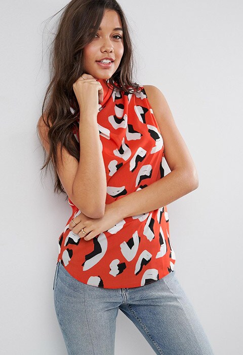 Model wearing ASOS sleeveless top with ruched high neck in abstract animal print | ASOS Fashion & Beauty Feed
