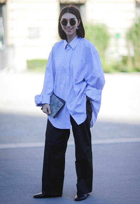 Street style star at Paris Haute Couture Fashion Week wearing an oversized shirt | ASOS Fashion & Beauty Feed