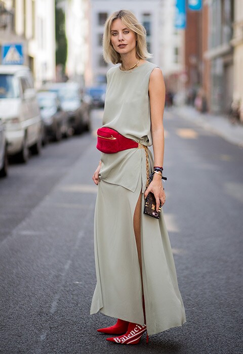 Blogger and street-style star Lisa Hahnbüeck wearing a red bumbag and Balenciaga x Supreme boots with a stone coloured dress | ASOS Fashion and Beauty Feed