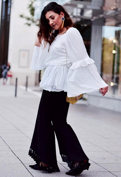 #AsSeenOnMe blogger wearing a ruffle top and tassel trousers | ASOS Fashion & Beauty Feed