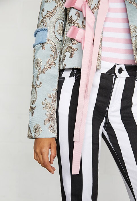 Model wearing striped jeans and french brocade jacket | ASOS Fashion & Beauty Feed 