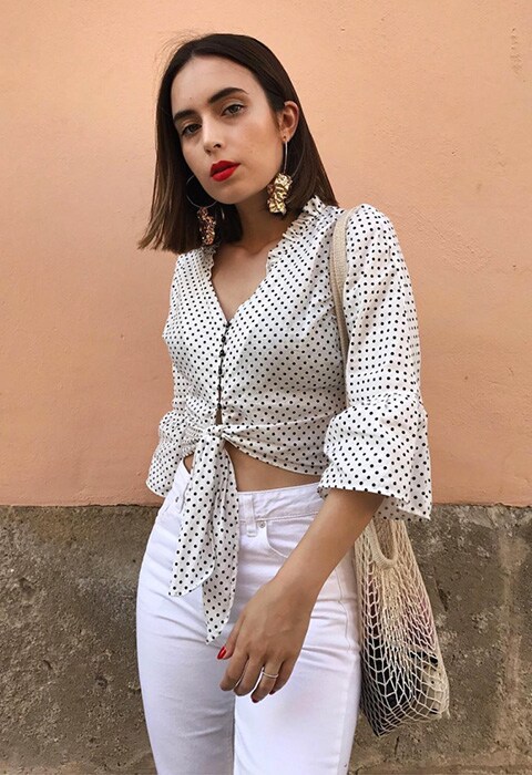 Blogger wearing a polka dot blouse | ASOS Fashion & Beauty Feed
