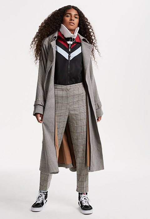 Model Laetitia wearing a check trench and trousers | ASOS Fashion & Beauty Feed