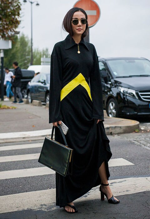 Blogger and designer Yoyo Cao wearing black midi dress with sports stripe | ASOS Fashion & Beauty Feed