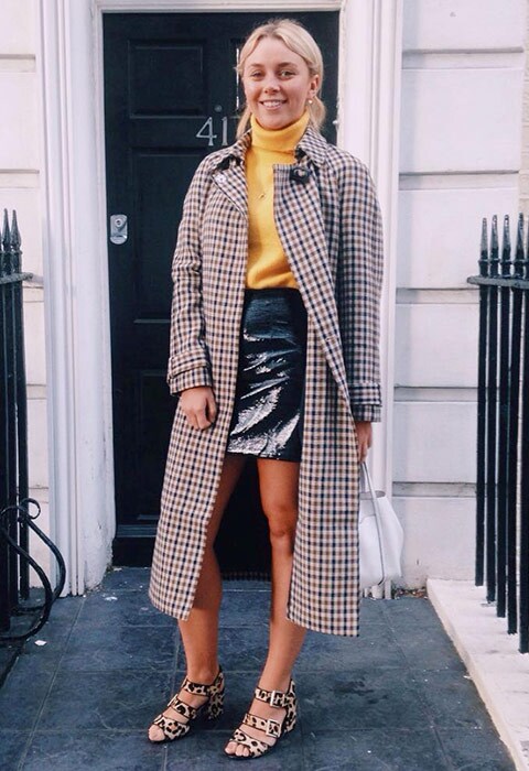 ASOS Insider Anna wearing a yellow roll neck, vinyl skirt and heritage checked coat | ASOS Fashion & Beauty Feed