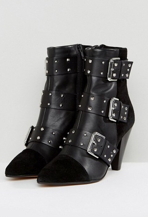 Black Friday ya esta aquí, lo que significa que los botines negros de piel con hebillas y tachuelas tienen que ser tuyos pronto. Con tacón y detalles en ante, son el remate perfecto para tu fondo de armario. ASOS Moda y tendencias.