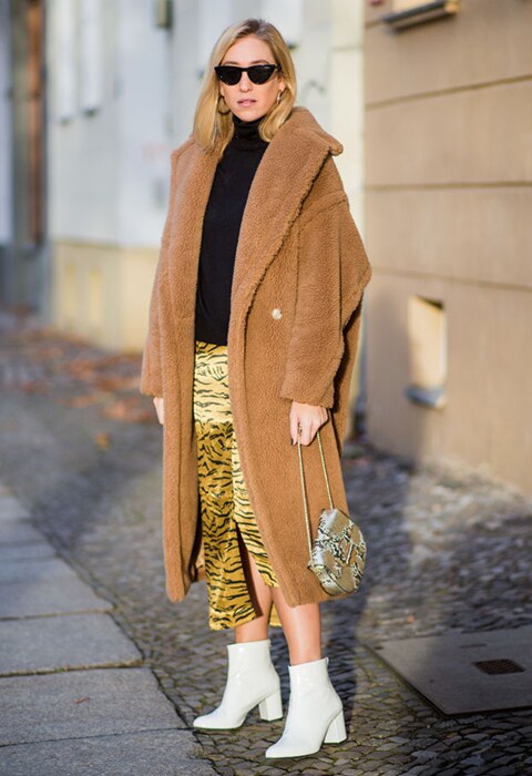 Sophie Lyson wearing a teddy coat and tiger-print skirt | ASOS Style Feed