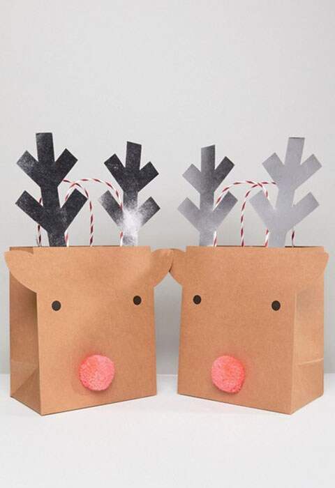 Bolsas de regalo medianas con diseño navideño de renos de Meri Meri