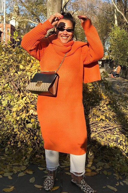 ASOS Insider Paloma wearing an orange jumper