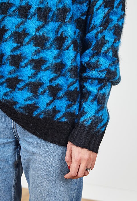 Sarah Jane Shellard wearing a dogtooth jumper