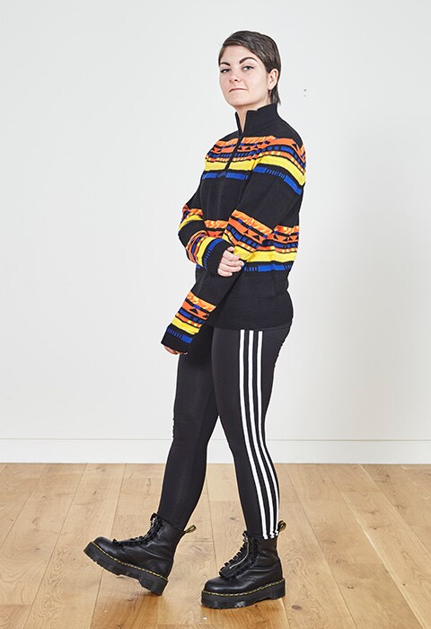 Rosie Sutcliffe-Smith  wearing half zip-up jumper